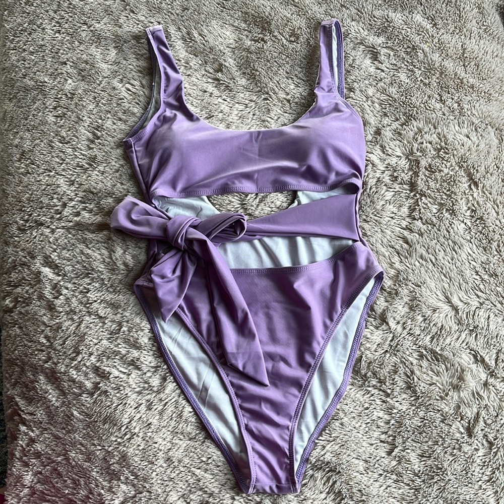 Adorable one piece cut out swimsuit size M